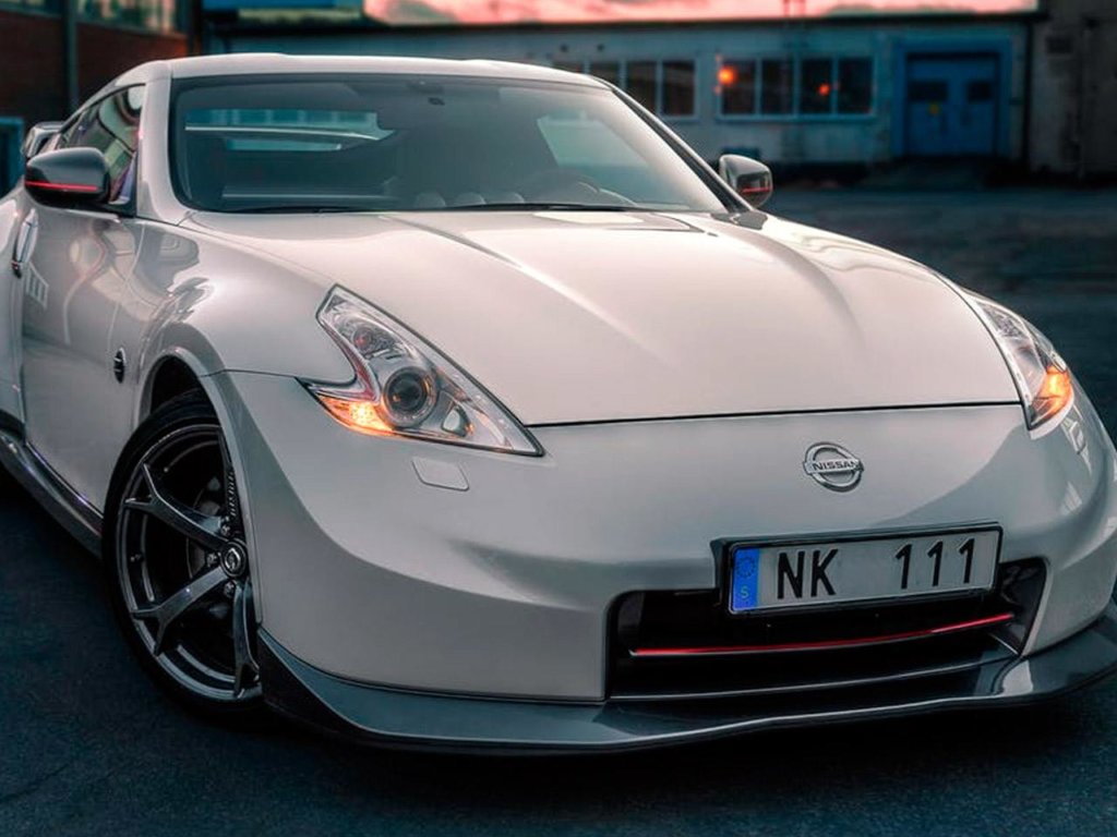 White Nissan 370Z transformed with a flawless finish by Elite Pro Car Care